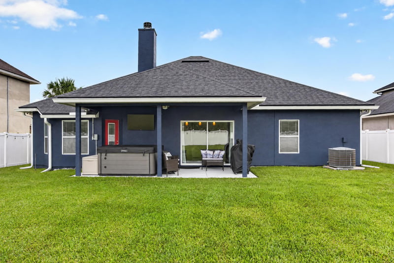 Backyard patio and lawn view at 538 Porta Rosa Circle, St. Augustine, FL 32092