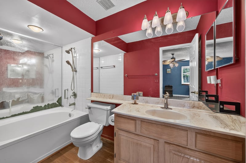 Bathroom with tub shower combo and vanity at 4837 Pareja Ct, Jacksonville, FL 32225
