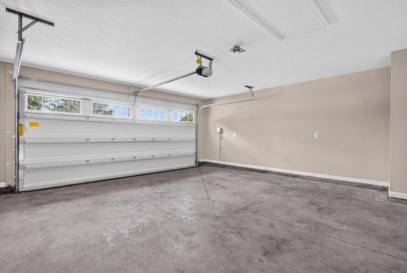 Garage interior with door to house at 7253 Townsend Village Ct, Jacksonville, FL