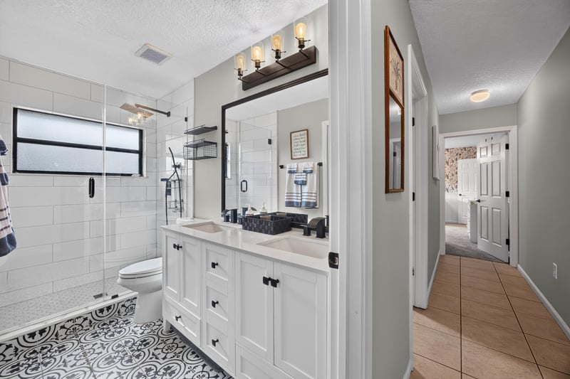 Bathroom with vanity and skylight at 2125 Blue Heron Cove Dr, Orange Park, FL 32003