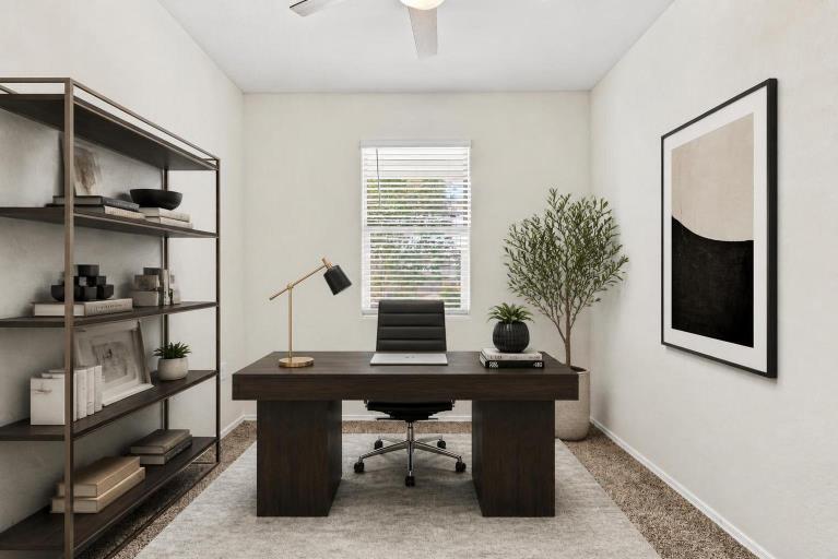 Bedroom set up as an office, virtually staged