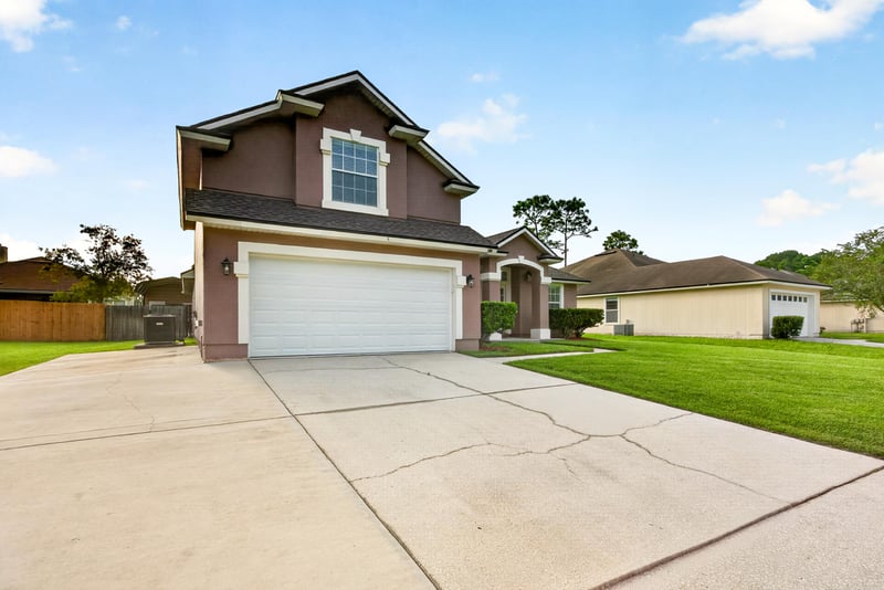 Front exterior and driveway view at 3112 Silverado Cir, Green Cove Springs, FL 32043