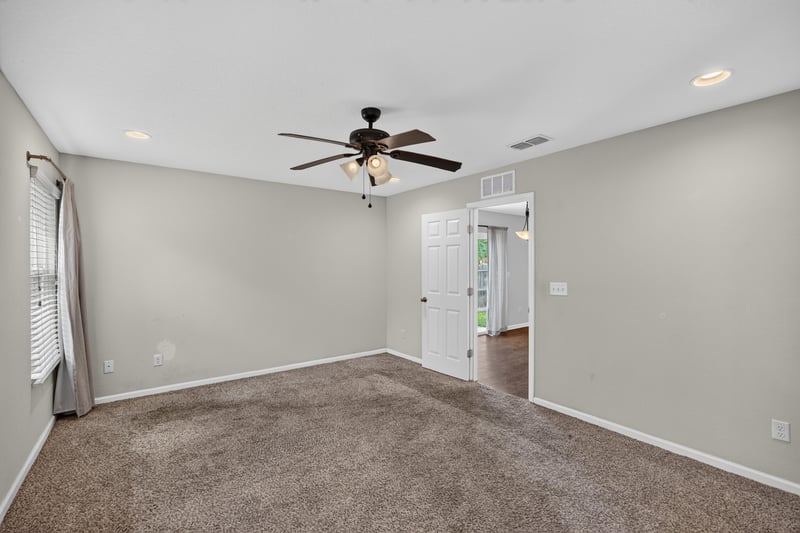 Empty carpeted room with ceiling fan at 1002 Ingleside Ave, Jacksonville, FL 32205