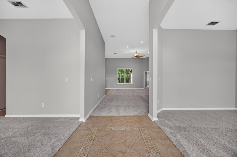 Hallway leading toward the living area at 635 Wakeview Dr, Orange Park, FL 32065