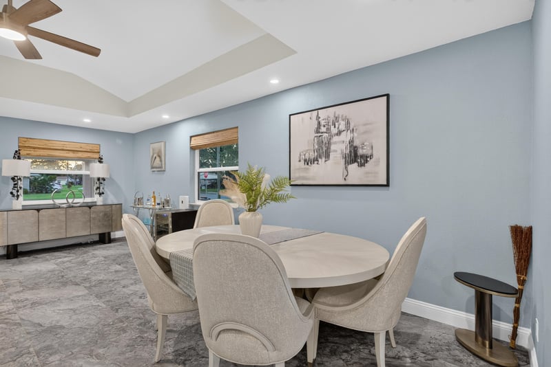 Dining room with round table and tray ceiling at 1525 8th St N, Jacksonville Beach, FL