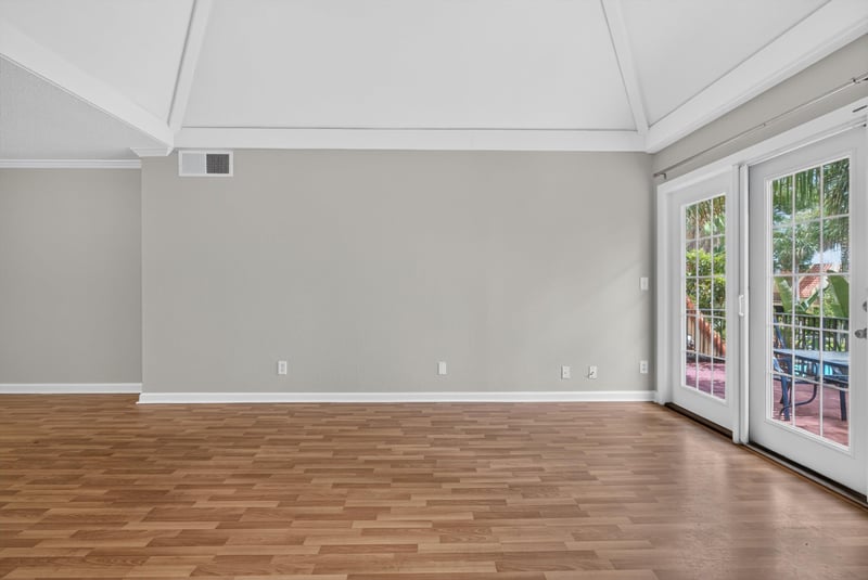 Living room with sliding glass doors at 3866 Campenero Ct unit 6, Jacksonville, FL 32217