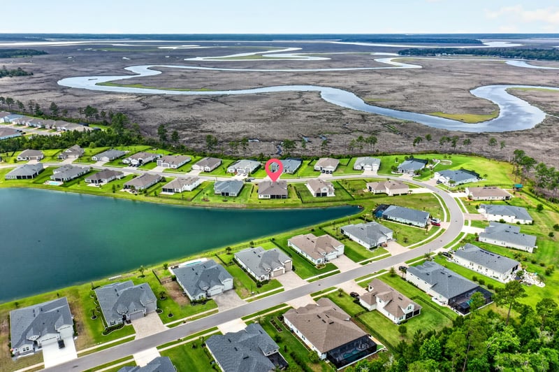 Drone view of marsh and waterway near the home in Fernandina Beach, FL