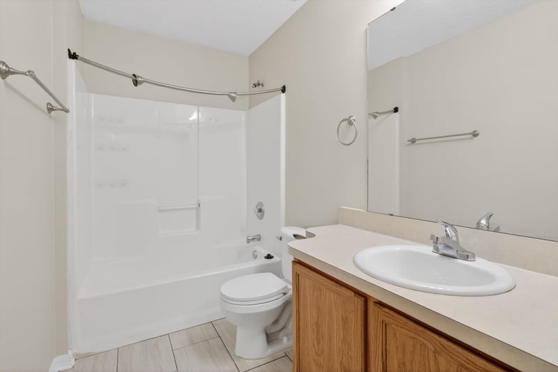 Bathroom with tub-shower combo and vanity at 1648 Glen Laurel Dr, Middleburg, FL 32068