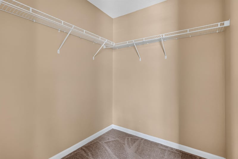 Empty closet with wire shelving at 12359 Mangrove Forest Ct, Jacksonville, FL 32218