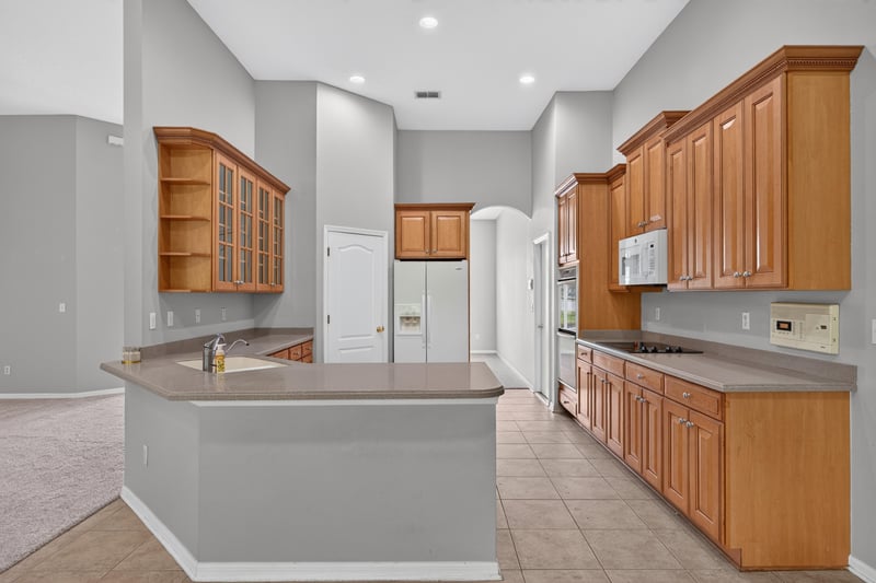 Kitchen island with appliances at 635 Wakeview Dr, Orange Park, FL 32065