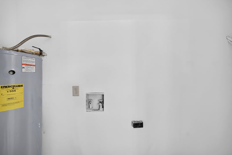 Utility closet with water heater at 3801 Crown Point Rd unit 2061, Jacksonville, FL 32257