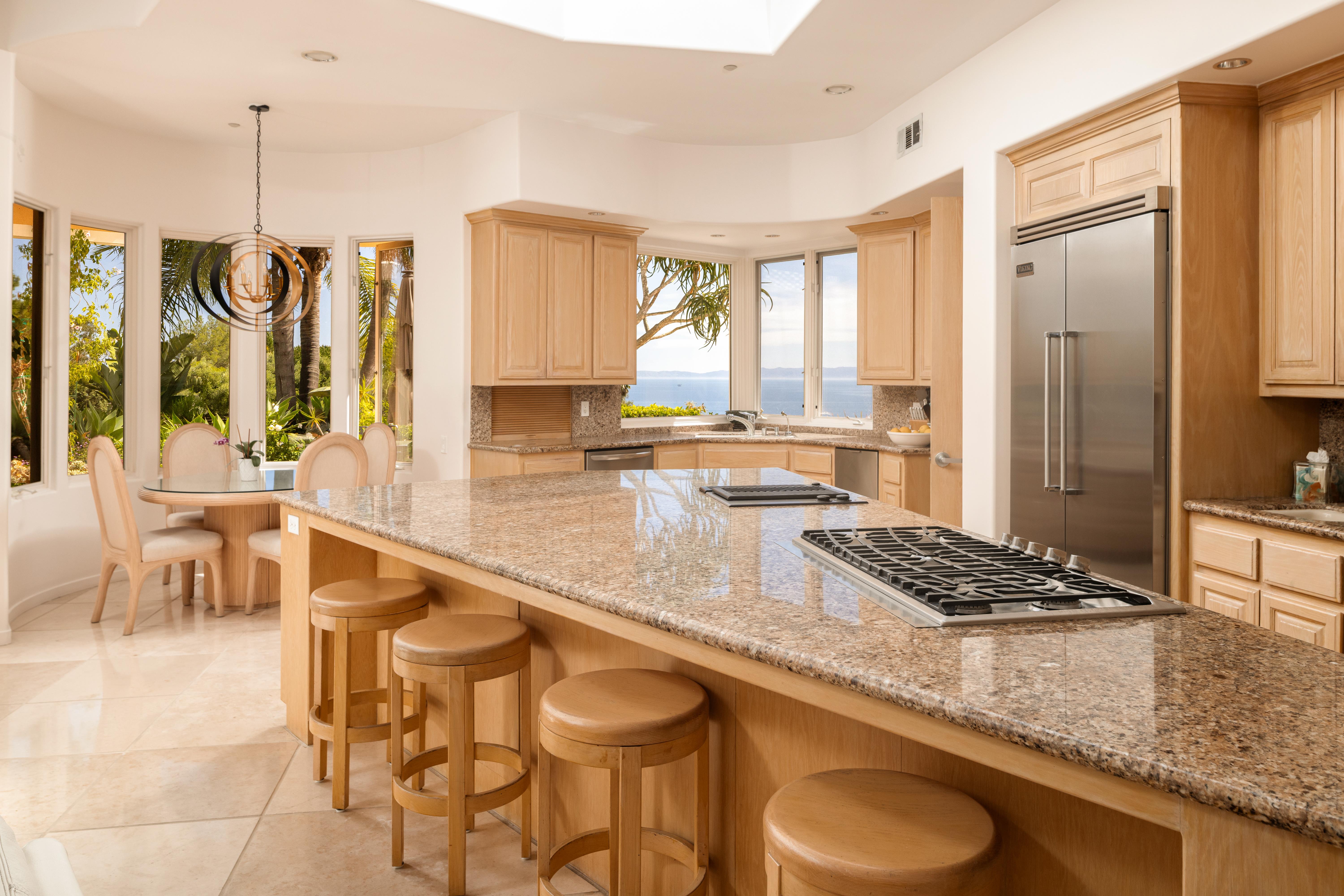 Real estate drone photography of 11 Hunt Drive Santa Barbara with sweeping Santa Ynez Mountain backdrop by VirTour Media