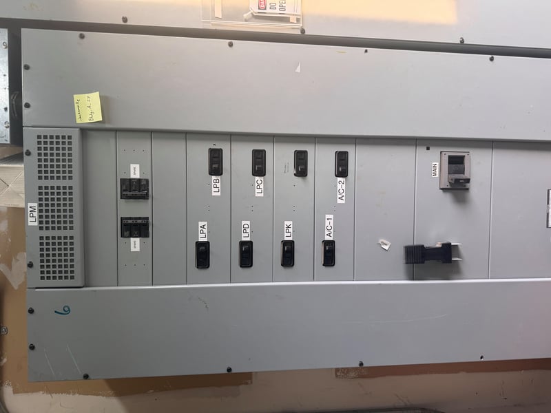 Electrical panel with multiple labeled disconnect switches at 11700 New Kings Rd, Jacksonville, FL 32219