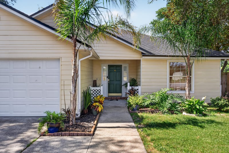 Front entry walkway and porch at 8680 Bandera Cir S, Jacksonville, FL 32244