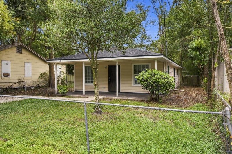 Street view of front facade and front yard at 219 Shortreed St, Jacksonville, FL 32254