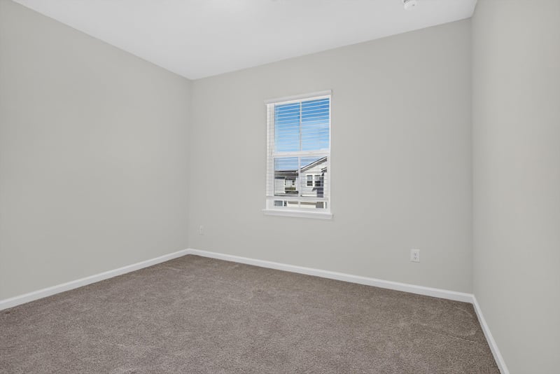 Bedroom with carpet and window at 39 Mellowood Ln, St. Augustine, FL 32092