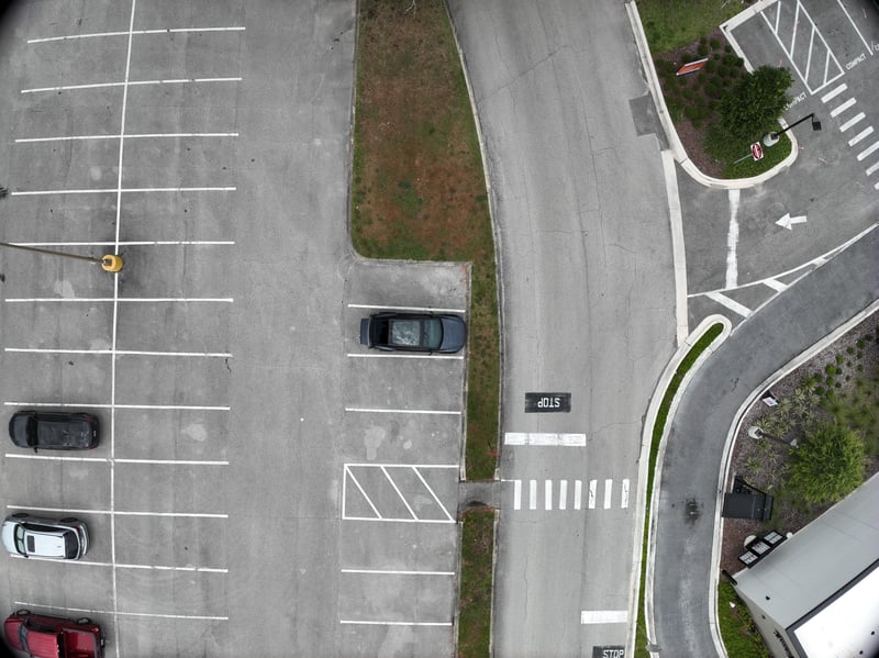Aerial view of parking lot and light pole at 9406 Atlantic Blvd, Jacksonville, FL 32225
