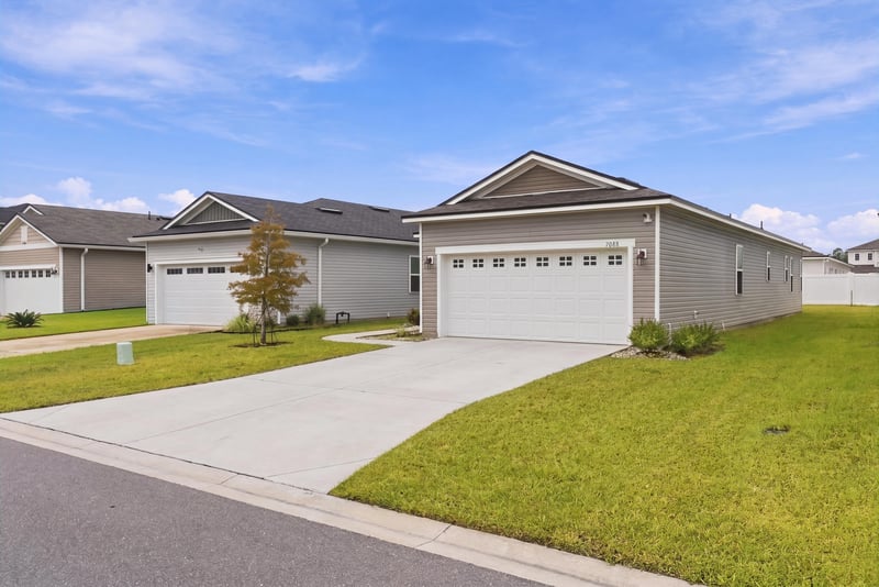 Front exterior viewed from the street at 7088 Mahogany Run Dr, Jacksonville, FL 32244