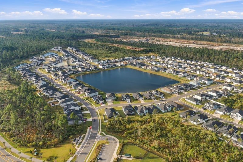 Drone view of community and pond, photographed by Megapixeler on Torres Trace, St. Augustine