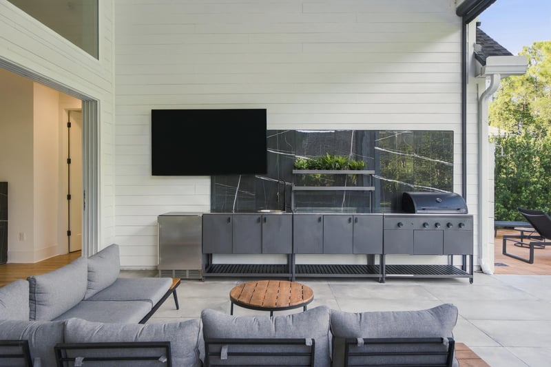 Outdoor kitchen patio with grill at 907 Seagrove Dr, Ponte Vedra Beach, FL 32081