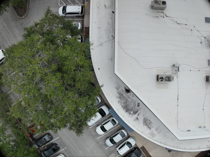 Aerial view of rooftop HVAC unit and parking lot at 9406 Atlantic Blvd, Jacksonville, FL 32225