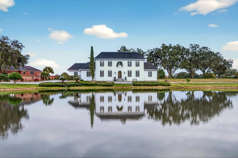 Front with Lake Reflection at 7987 Hollyridge Rd, Jacksonville, FL 32256