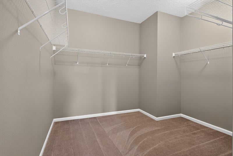 Walk-in closet with wire shelving at 13685 Goodson Pl, Jacksonville, FL 32226