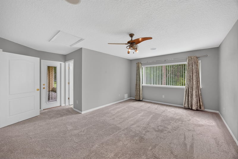 Bedroom with ceiling fan and window at 635 Wakeview Dr, Orange Park, FL 32065