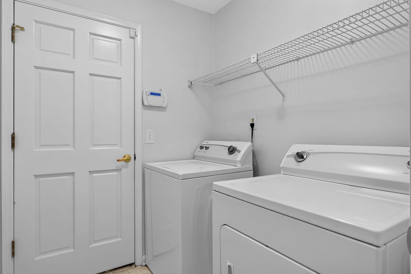 Laundry room with washer and dryer at 12810 Swamp Owl Ln