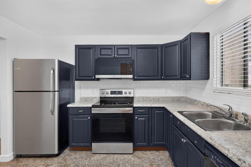 Kitchen with stainless stove and refrigerator at 3801 Crown Point Rd unit 2061, Jacksonville, FL 32257