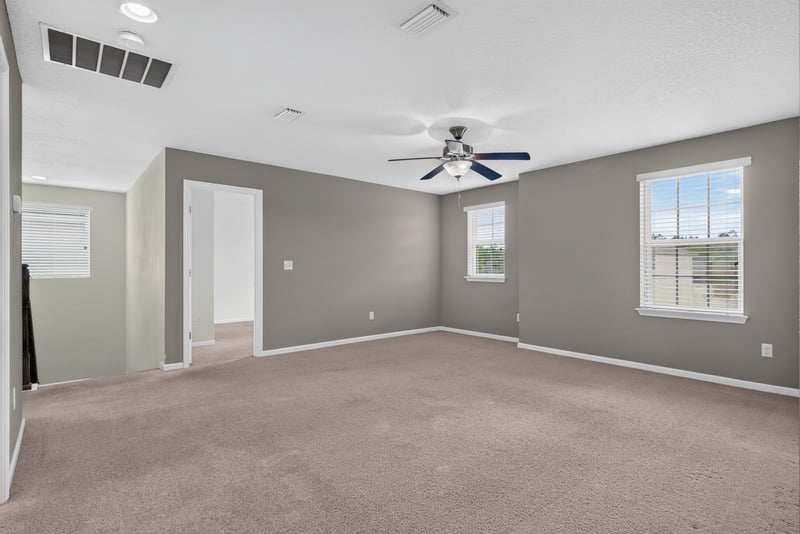 Living room with carpet and ceiling fan at 263 Gilmore Ln, Orange Park, FL 32065