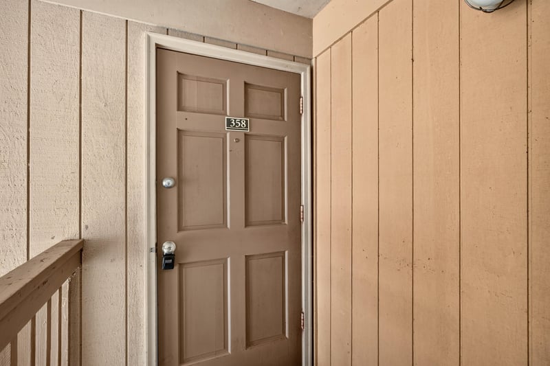 Front door numbered 358 at 1800 Park Ave apt 358, Orange Park, FL