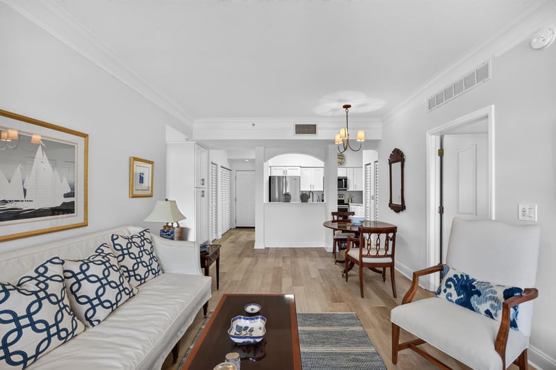 Living and dining area with wood flooring at 10435 Mid Town Pkwy unit 135, Jacksonville, FL 32246