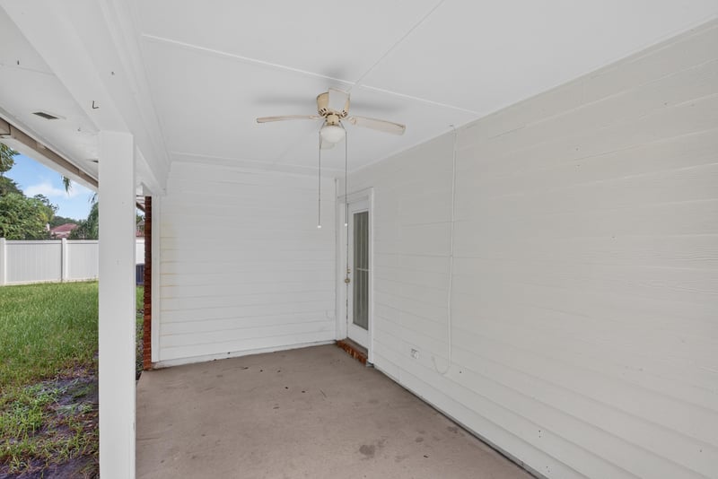 Garage interior with view toward the backyard at 11669 Collins Creek Dr, Jacksonville, FL 32258
