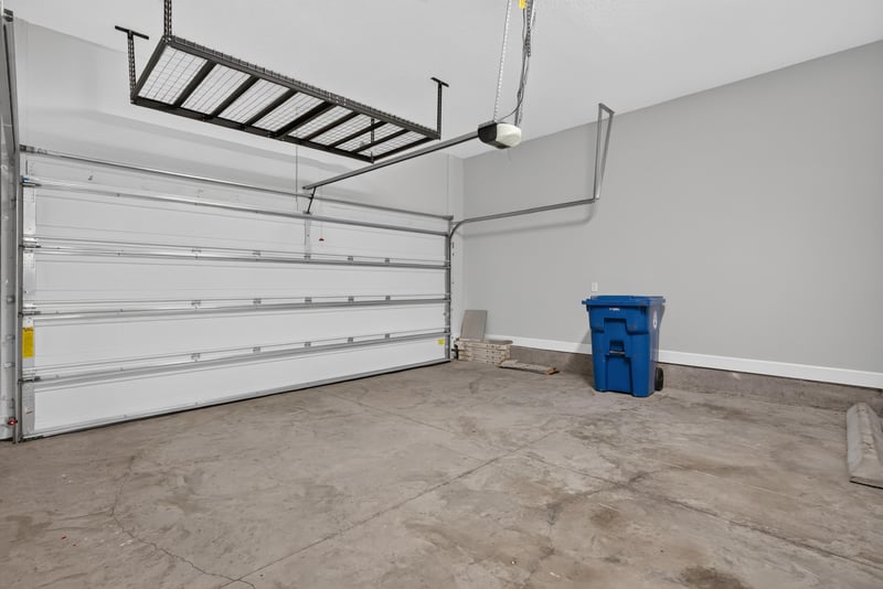 Garage with overhead storage rack at 7446 Loggerhead Ct, Jacksonville, FL 32256