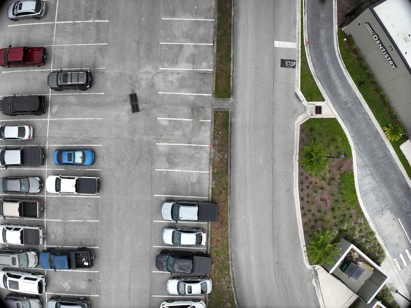 Aerial view of parking lot and small structure at 9406 Atlantic Blvd, Jacksonville, FL 32225