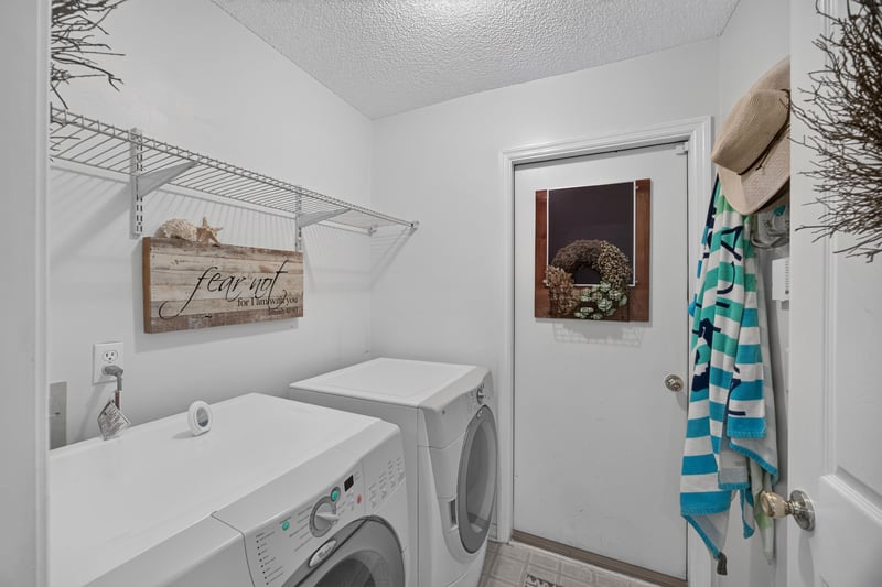 Laundry room with washer and dryer at 1820 Burgess Hill Dr E, Jacksonville, FL