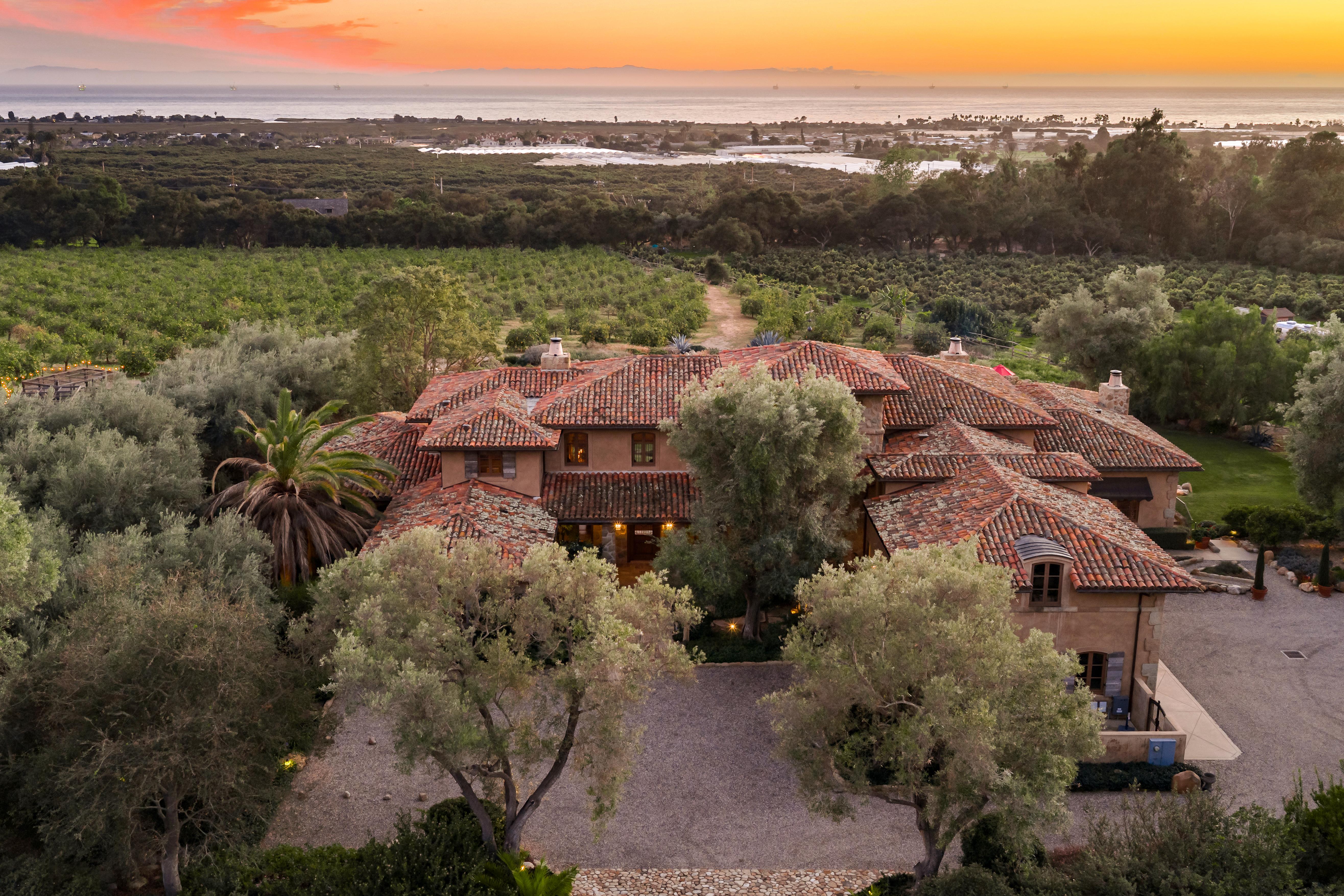 Real estate drone photography showcasing the Montecito foothills and Santa Ynez Mountain backdrop visible from 1915 Monte Alegre Dr, Carpinteria — a rare Southern California estate of singular proportion and presence. Our team captured editorial photography, aerial drone photography via Inspire 3 Cinema Drone, a cinematic property video, a true vertical social media reel, and twilight photography from midday through twilight.