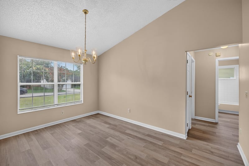 Dining area with chandelier and window at 6646 Shiloh Creek Dr