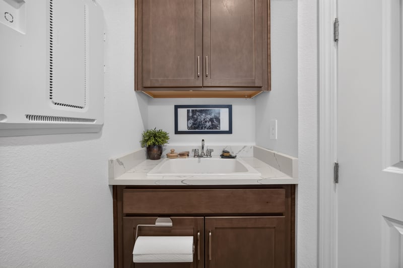 Powder room vanity with quartz counter at 129 Amberwood Dr, St. Augustine, FL