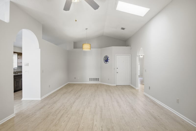 Living area with arched doorway at 678 5th Ave N, Jacksonville Beach, FL 32250