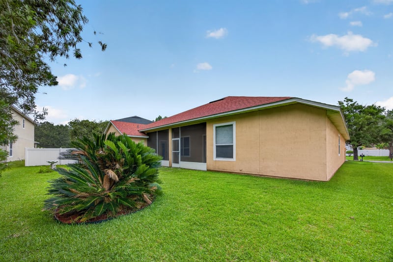Backyard with palm tree at 635 Wakeview Dr, Orange Park, FL 32065