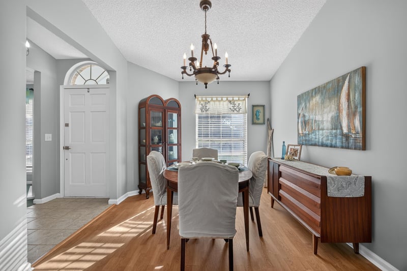 Dining room view with wood flooring at 4556 Shaky Leaf Ln N, Jacksonville, FL 32224