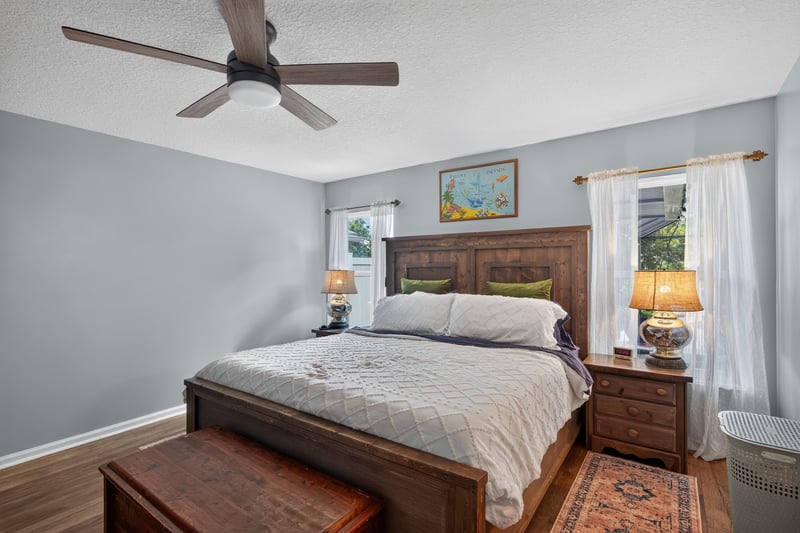 Bedroom with wood furniture at 1589 Backwater Drive, Middleburg, FL 32068
