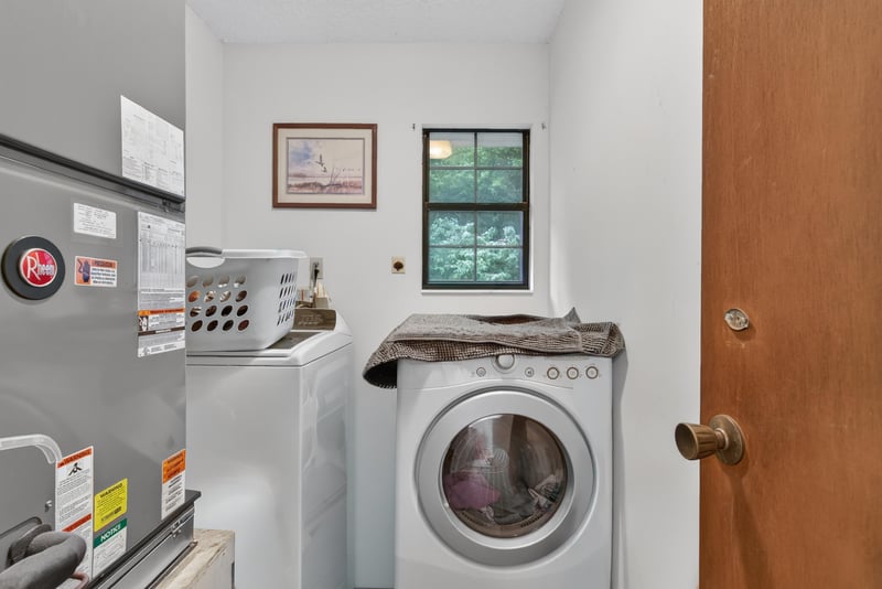 Laundry area with washer, dryer and utility sink at 3249 Maryland Ave, Green Cove Springs, FL