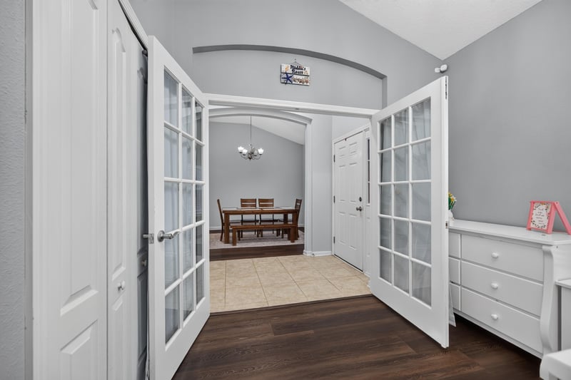 Hallway with French doors leading to dining area at 538 Porta Rosa Circle, St. Augustine, FL 32092