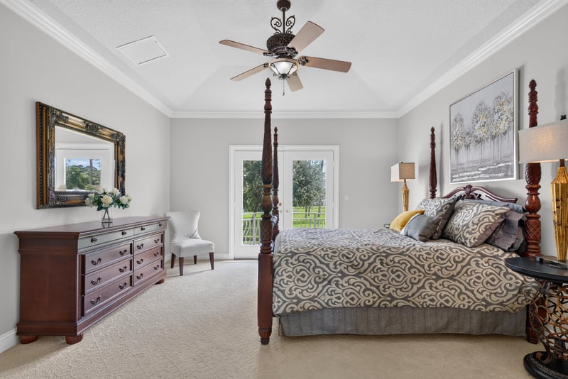 Bedroom with four-poster bed and ceiling fan at 344 Broward Rd, Jacksonville, FL