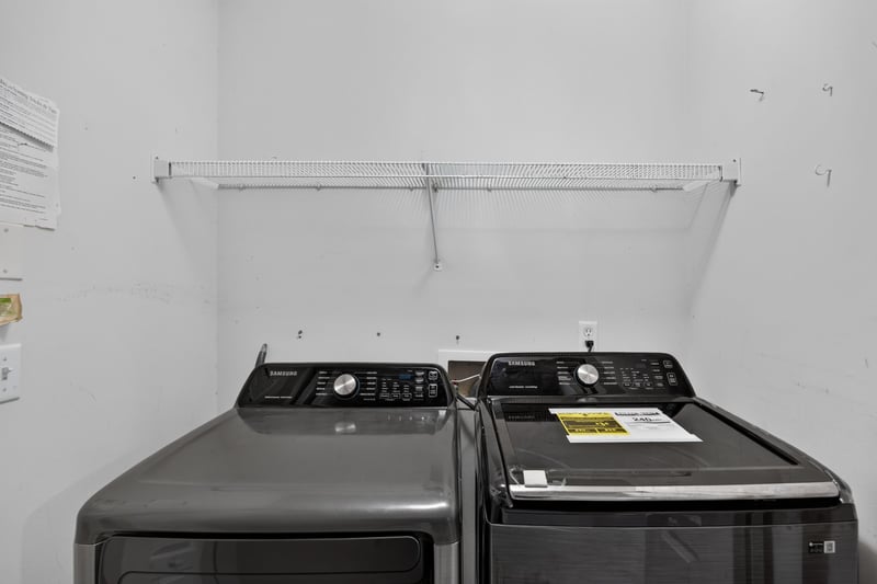 Laundry area with shelf at 9691 Nelson Forks Dr, Jacksonville, FL 32222