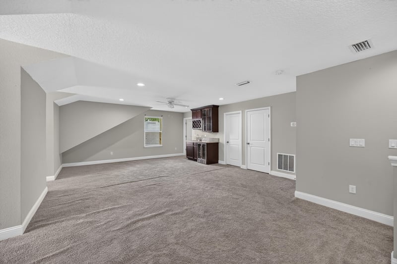 Bonus room with carpet and angled walls at 53 Lumen Ct, St. Augustine, FL 32095