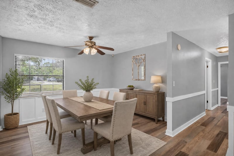 Dining area with table, chairs and natural light at 6757 Deer Springs Rd, Keystone Heights, FL 32656